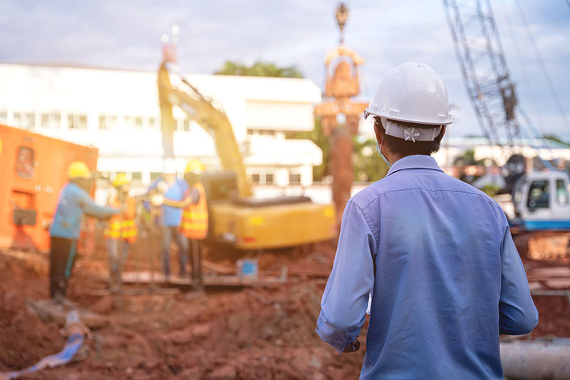 Surveyor on new build site